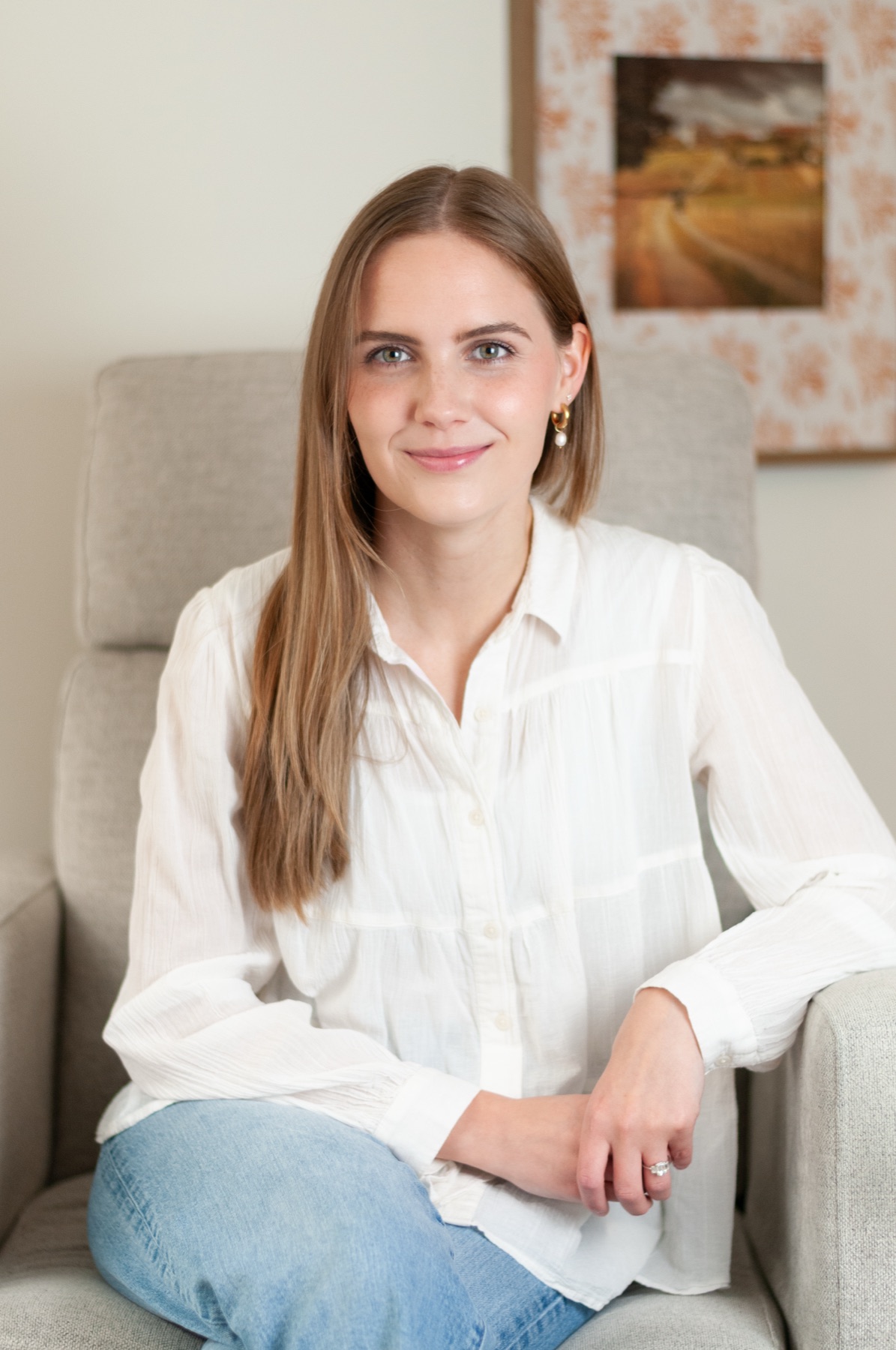 Olivia Brooks seated in her Nashville therapy office